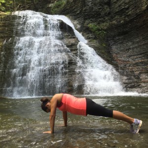 The 30-day #midtownyogachallenge. Day 22: Plank in a waterfall in Grimes Glen.