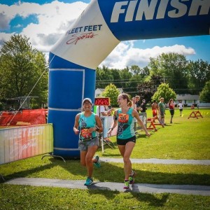 Best race pic ever. We are laughing our butts off since neither of us were well-trained for this race. But we finished.