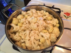 Cauliflower florets are simmering.